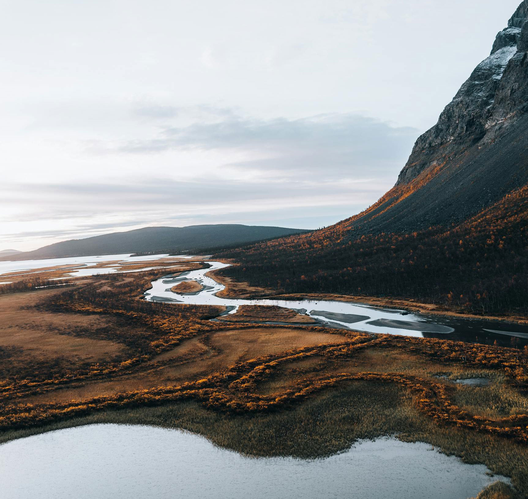 photo-of-fjord-with-landscape-and-mountains
